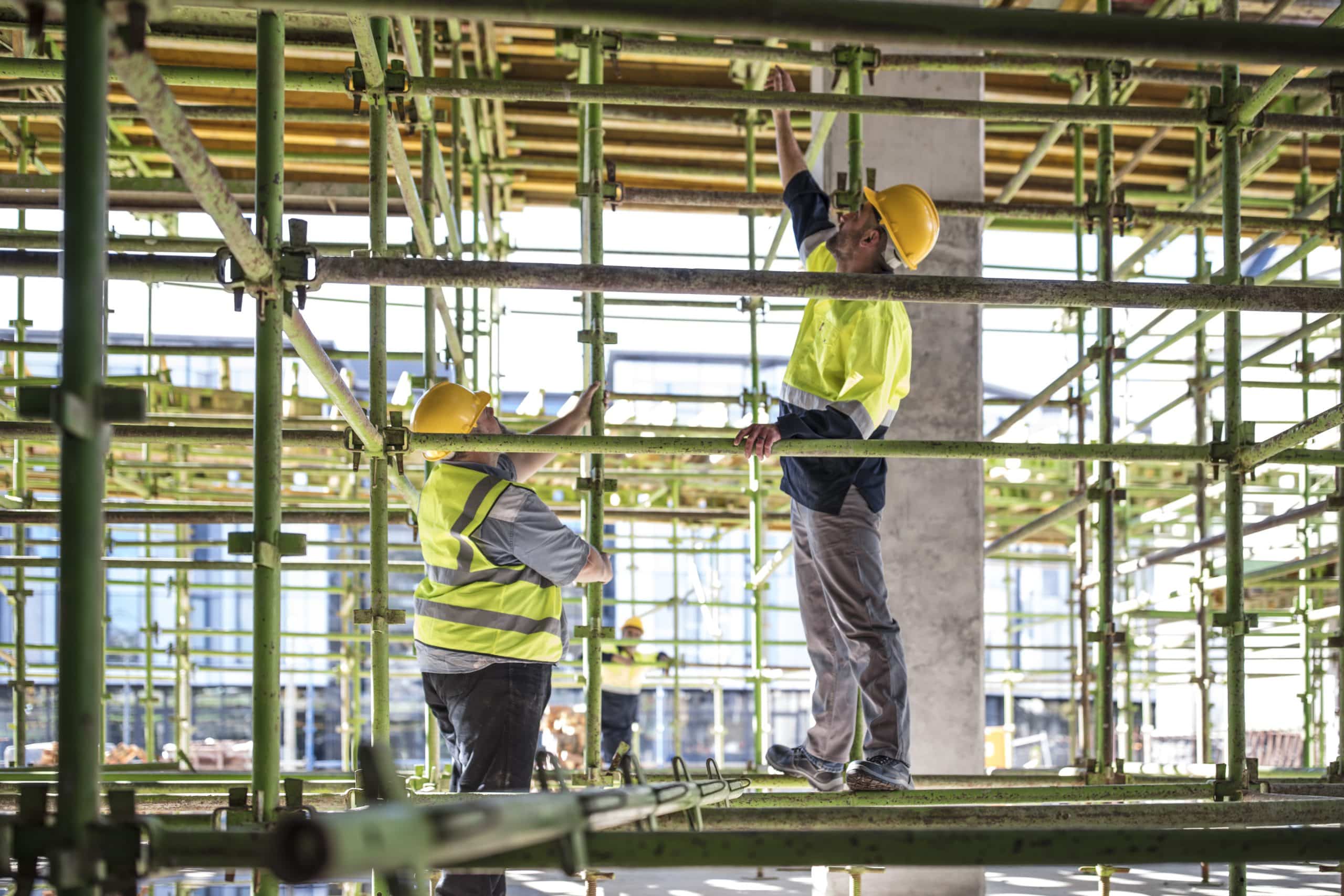 Construction workers on scaffolding